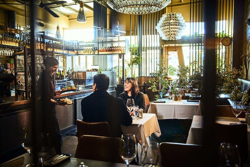 2504 img taupo town vine bistro bar eat drink couple talking to waiter fine dining todd eyre