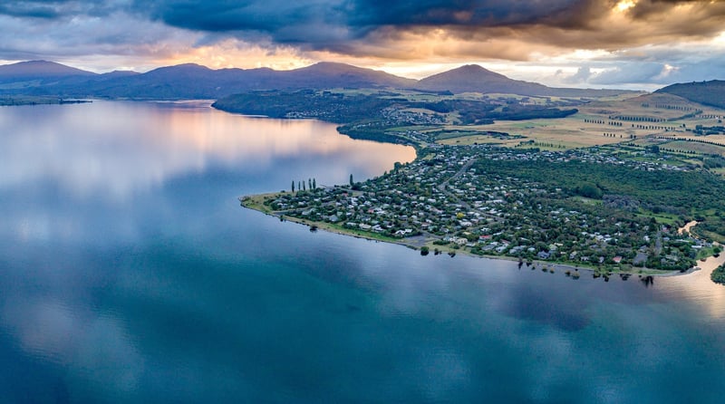 2504 img turangi kurata scenic souhern lake settlement sunset glassy lake large 2580x1440