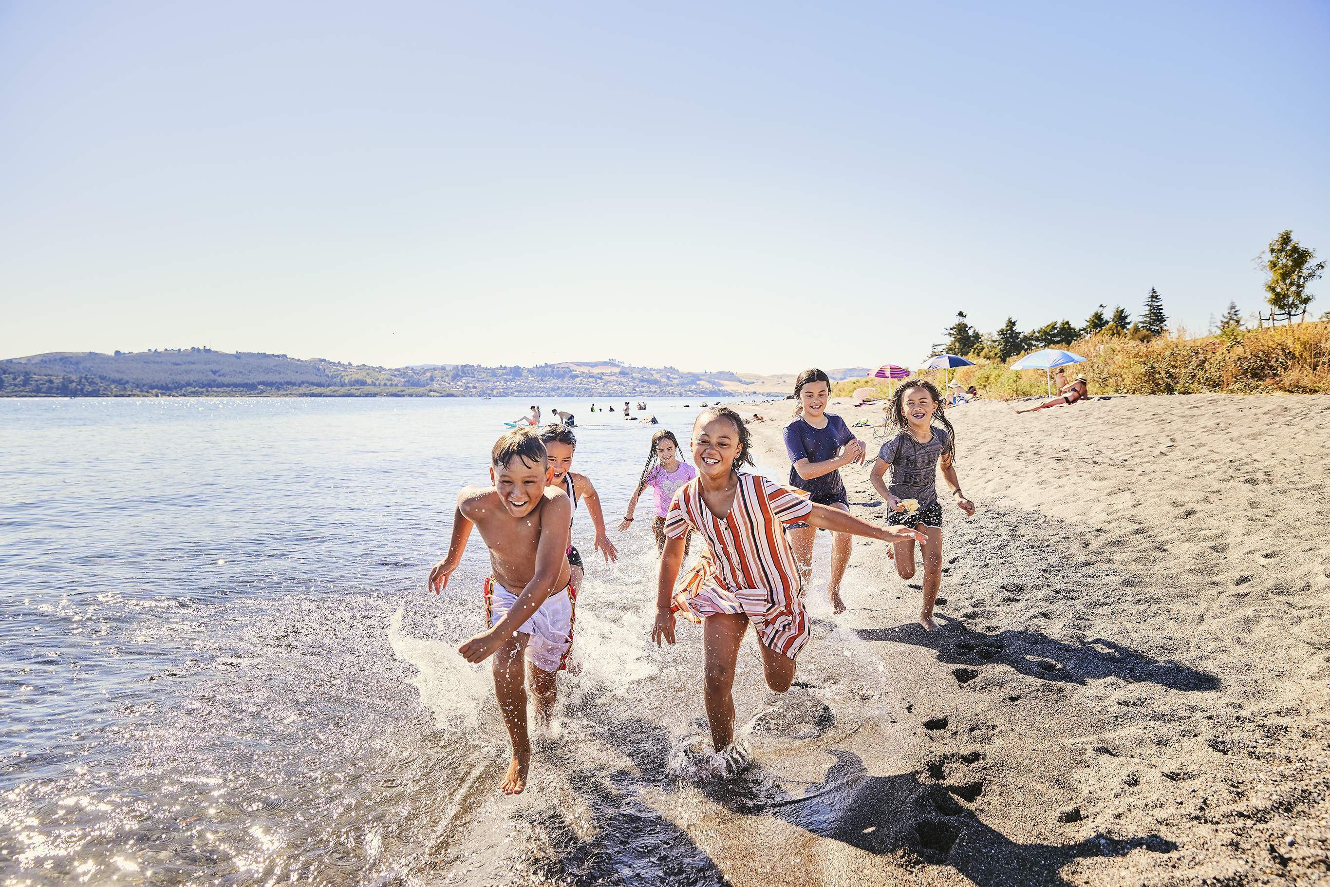 2505 img taupo town wharewaka beach front lake family playing family friendly kids water